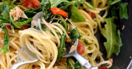 Delicious tuna pasta with arugula and sun-dried tomatoes, perfect for a quick and healthy meal. Enjoy this flavorful recipe!