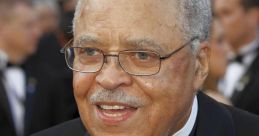 James Earl Jones smiles in a tuxedo at a formal event, showcasing his iconic presence and legendary career in film.