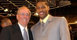 Brett Davidsen and another man posing together at a formal event, showcasing their stylish attire and cheerful expressions.