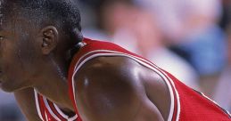 Michael Jordan catching his breath during a game, showcasing his athleticism and iconic Chicago Bulls uniform.