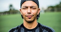 Roberto J10, confidently posing in a soccer jersey, showcases his passion for the sport on the green field.