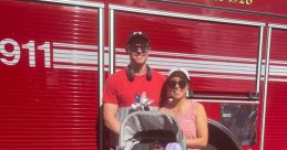 Family posing in front of a West University fire truck, celebrating a festive occasion with patriotic outfits and decorations.