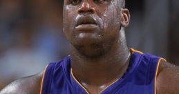 Shaquille O'Neal, Los Angeles Lakers jersey, intense game moment, focused expression, showcasing athleticism and determination.