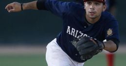 Alex Robles fields a ground ball during a baseball game, showcasing athleticism and precision on the field.