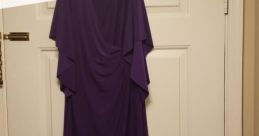 Draped purple dress on hanger, perfect for casual or elegant occasions. Shop Lauren Flurry styles on Poshmark today!