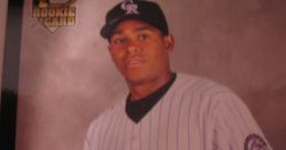 Alberto Arias rookie card featuring the Colorado Rockies, showcasing his signature and professional baseball attire.