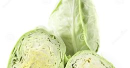 Freshly cut green cabbage showcasing vibrant layers and crisp leaves, perfect for salads and healthy dishes.