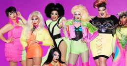 Colorful group of drag queens in vibrant outfits posing confidently against a bright purple backdrop, showcasing fierce drag style.