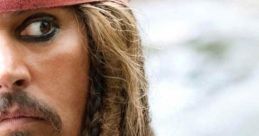 Close-up of a pirate with a red bandana and braided hair, channeling the adventurous spirit of "Pirates of the Caribbean.