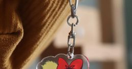 Kiki Canta keychain featuring Kiki with a broom and her cat, showcasing a cute and colorful design for fans.