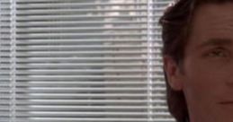 Patrick Bateman in an office setting, portraying a confident and calculated demeanor with a professional look.