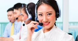 Smiling customer service representative with headset, showcasing effective communication and teamwork in a bustling call center.