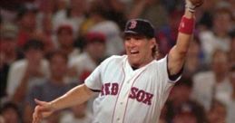 David Naehring celebrates a play on the field wearing a Red Sox jersey, surrounded by an enthusiastic crowd.