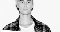 Justin Bieber Love Yourself - The melodic strumming of an acoustic guitar fills the room, setting the stage for the smooth