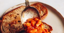 Beans on TOAST! The of a toaster popping up a perfectly crisp slice of bread fills the kitchen with a satisfying "ding!" as