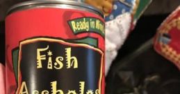 Can of "Fish Assholes" in tomato and cheese sauce, a humorous and quirky food item. Perfect for meme culture.