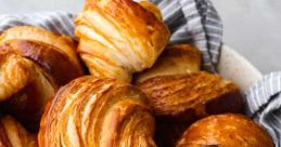 CROISANT-_- The of a croissant being freshly baked in the oven is a symphony of crackling and sizzling. The butter within