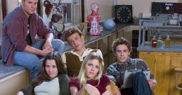 Freaks and Geeks cast seated in a classroom, embodying the show's teenage struggles and friendships in Season 1.