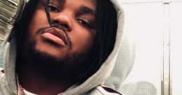 Tee Grizzley Tee Grizzley burst onto the scene with his raw and powerful storytelling abilities, capturing the attention of