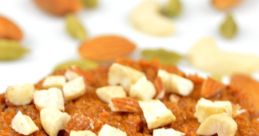 Delicious Kunda dessert topped with chopped nuts, perfect for festive celebrations and traditional feasts.