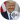 Smiling Donald Trump in a suit, with an American flag backdrop, showcasing an official portrait.