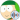 Kyle Broflovski, personaje de South Park, con gorro verde y abrigo naranja, sonríe en un fondo natural.