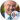 Dr. Phil McGraw smiling confidently, wearing a suit with a patterned tie, exuding charisma and warmth in a relaxed setting.