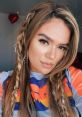 Karol G Karol G is a rising superstar in the world of Latin . With her infectious beats, powerful lyrics, and captivating