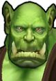 Close-up of a Peon from Warcraft III: Reign of Chaos, showcasing the iconic green skin and fierce expression of the orc character.