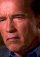 Arnold Schwarzenegger speaking on 60 Minutes, showcasing his thoughtful expression during an interview.