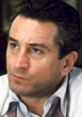 Close-up of a serious Robert De Niro, showcasing his intense expression and captivating gaze, embodying classic cinematic charisma.