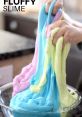 Fluffy slime in vibrant colors being stretched by hands, showcasing its stretchy texture and fun play experience.