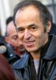 Jean-Jacques Goldman [Quand La Musique Est Bonne Voice] Type your text to hear it in the voice of Jean-Jacques Goldman