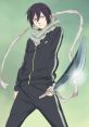 Yato from Noragami poses confidently with his sword, showcasing his stylish outfit and trademark scarf.