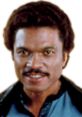 Lando Calrissian smiling confidently in his iconic blue outfit from Star Wars, showcasing his charming persona.