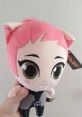 Cute plush toy featuring a character with pink hair and large eyes, perfect for collectors and animation fans.