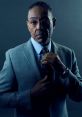 Giancarlo Esposito as Gustavo Fring, dressed sharply in a suit, exudes confidence in a dramatic, moody lighting.