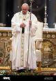 Pope Francesco in ceremonial robes, holding a staff, exemplifying his role as a prominent Italian religious leader.