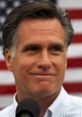 Mitt Romney smiling at a campaign event, American flag backdrop, engaging with supporters, highlighting political activities.