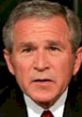 Close-up of George W. Bush, highlighting his expression during a formal address or event. Emphasizes leadership and presence.