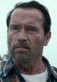 Arnold Schwarzenegger's intense expression captures emotional depth in his role in the film "Maggie.