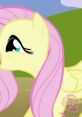 Fluttershy from My Little Pony: Remasterizada, showcasing her signature pink mane and gentle expression in a serene setting.