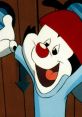 Wakko Warner animated character with a playful smile, wearing a red hat and blue shirt, from Animaniacs by Jess Harnell.