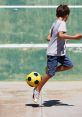 Soccer-Playing-Ambience The atmosphere in a local soccer park is always filled with an infectious energy that can only be