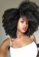 Afro The Afro S. is vibrant and pulsating, filled with a rhythmic energy that is both infectious and entrancing. The