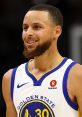 Stephen Curry smiles in his Golden State Warriors jersey, showcasing his iconic style and charisma on the basketball court.