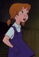 Penny from The Rescuers (1977) animated film, wearing a purple dress and showcasing her adventurous spirit.