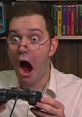 Angry Video Game Nerd expressing intense frustration while gaming, holding a controller and displaying shock and excitement.