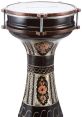 Darabuka Tap. The of fingers gently tapping on the metallic surface of a Darabuka drum sends vibrations through the air,