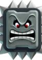 Angry spiky block enemy from Mario Party 2, known for challenging players with its menacing face and sharp edges.